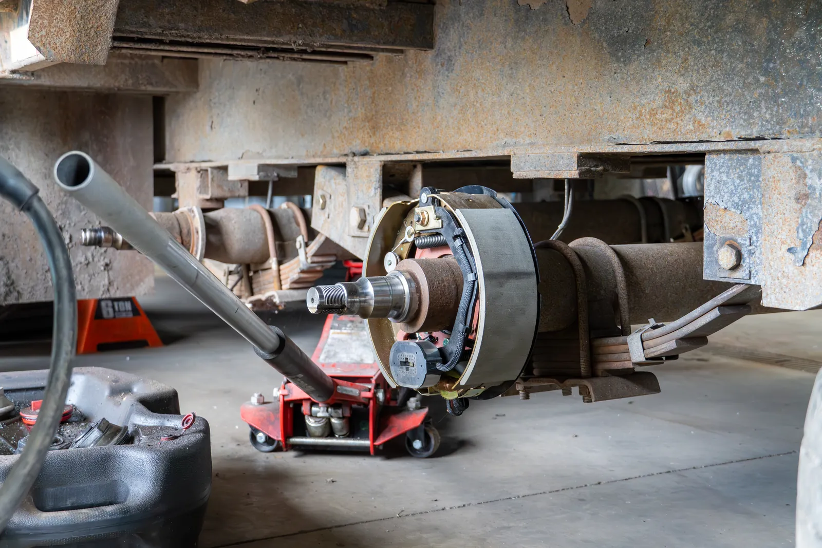 Brake and hub work on a trailer in the Flatlander shop
